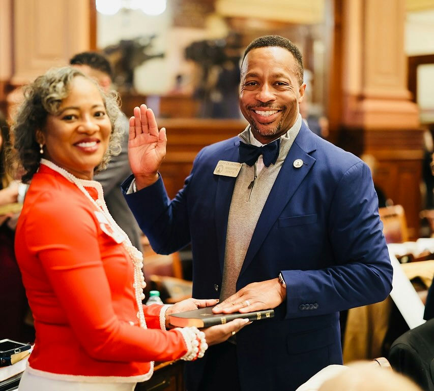 As the New Year heralds a fresh legislative session, a significant milestone was celebrated this morning. At 10 a.m., the privilege of taking "The Oath" for a fifth term of office was embraced, marking a continued commitment to serving the remarkable people of District 68 and Georgia. This event coincided with Delta Sigma Theta Sorority Incorporated's 112th Founders’ Day, adding layers of meaning and pride, especially with the personal Bible held by the esteemed CaMia Jackson. This dual celebration underscores a dedication to public service, public policy, and the community it serves. Stay engaged and informed about District 68's initiatives and updates to continue supporting efforts for progress and positive change. Media Credit: Derrick Jackson